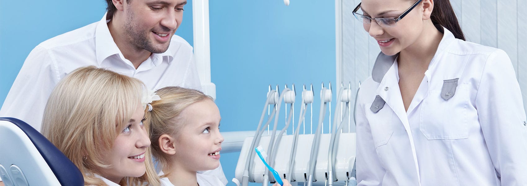 Happy family at the dental