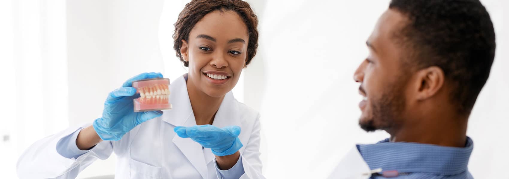 Dentist explain about the treatments to dentist
